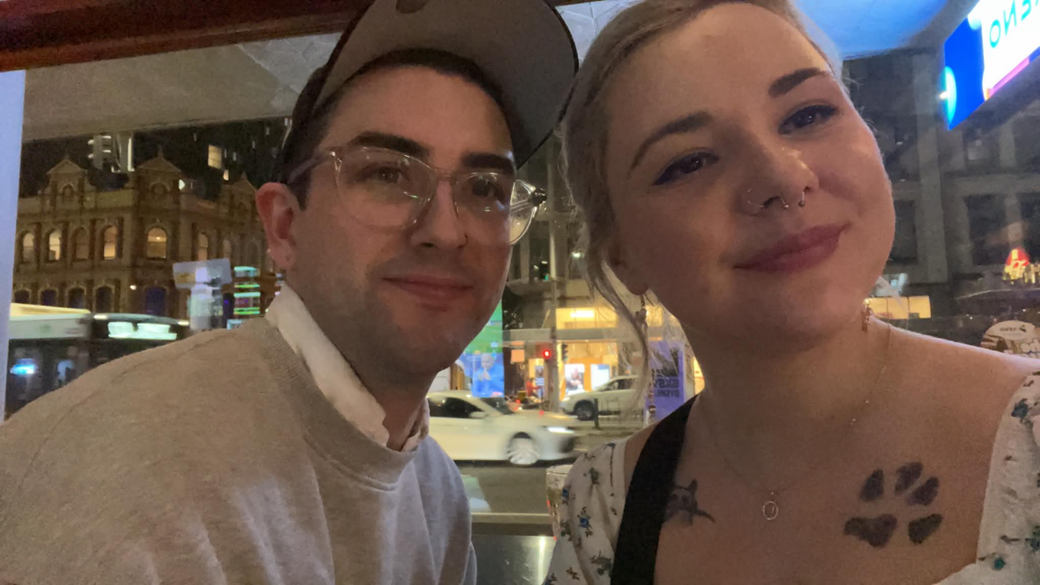 A night-time street selfie of the two of them